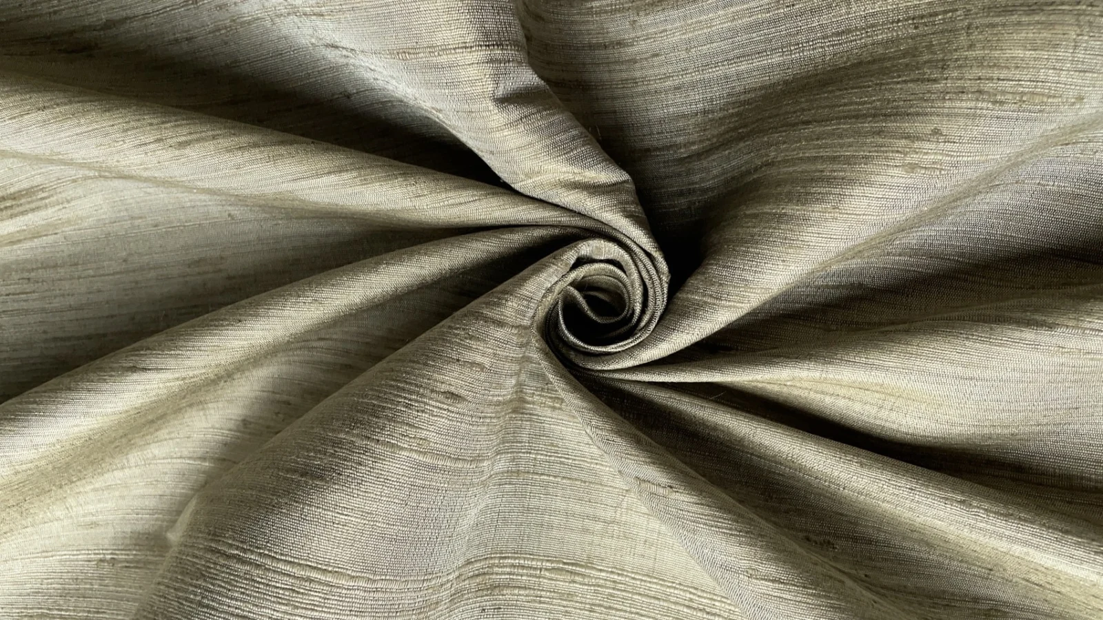 Naturally dyed slubbed silk in grey-green and golden brown